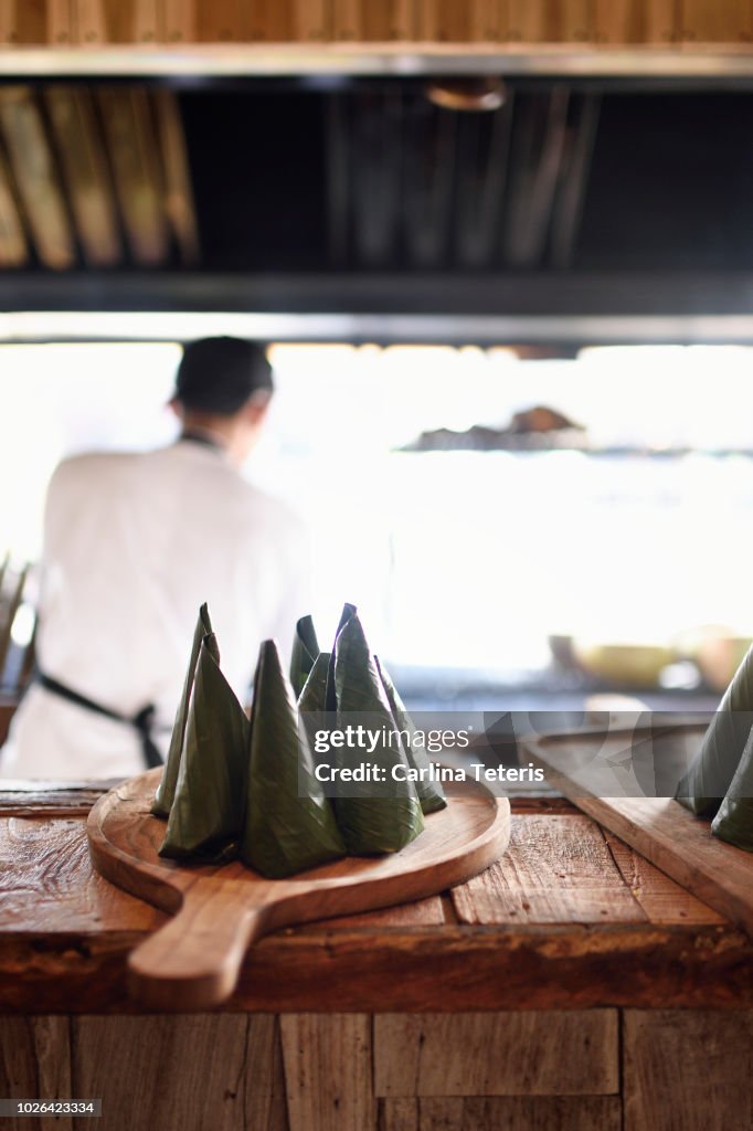 Indonesian rich packets wrapped in banana leaf