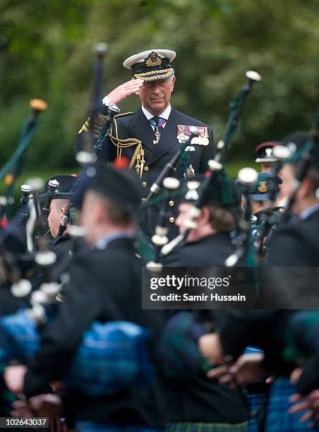 Prince Charles, Prince of Wales takes the salute as Cadet Forces take part in the Cadet 150 Royal Review Parade down The Mall on July 6, 2010 in...