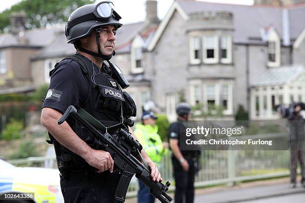 Armed police patrol the village of Rothbury as the search for armed fugitive Raoul Moat goes on in the north-east of the country on July 6, 2010 in...