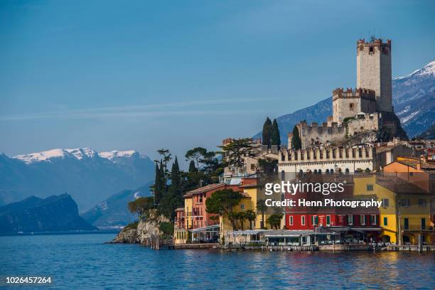 scaliger castle seen from lake garda, malcesine, verona, italy - verona stock pictures, royalty-free photos & images