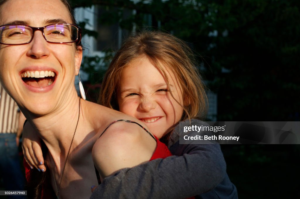 Smiling mother and daughter