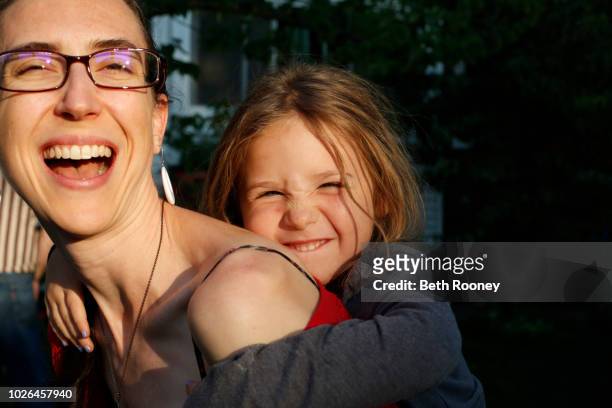 smiling mother and daughter - aunt niece stock pictures, royalty-free photos & images
