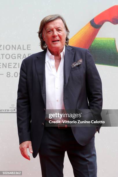 Adriano Panatta walks the red carpet ahead of the "The Armadillo's Prophecy " screening during the 75th Venice Film Festival at Sala Darsena on...