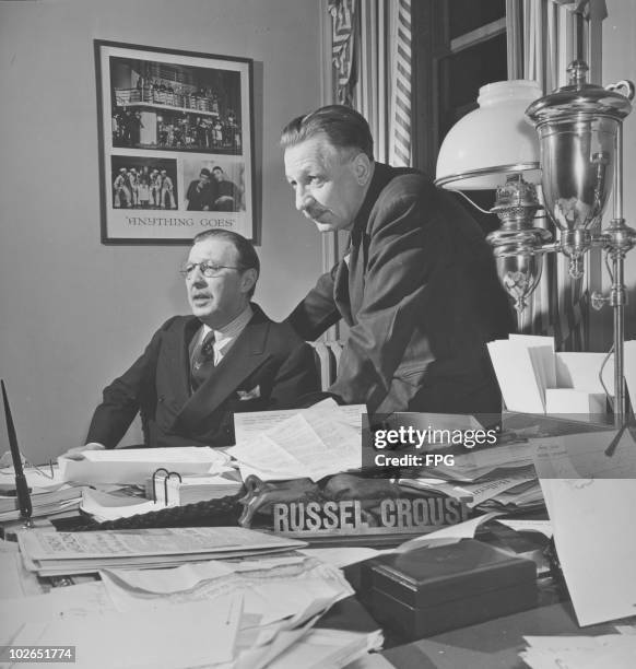 American playwright partners Russel Crouse and Howard Lindsay in Crouse's office, circa 1947. Behind them is a poster for their revised version of...