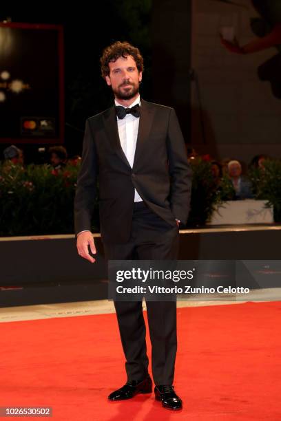 Francesco Montanari walks the red carpet ahead of the "Dragged Across Concrete" screening during the 75th Venice Film Festival at Sala Grande on...