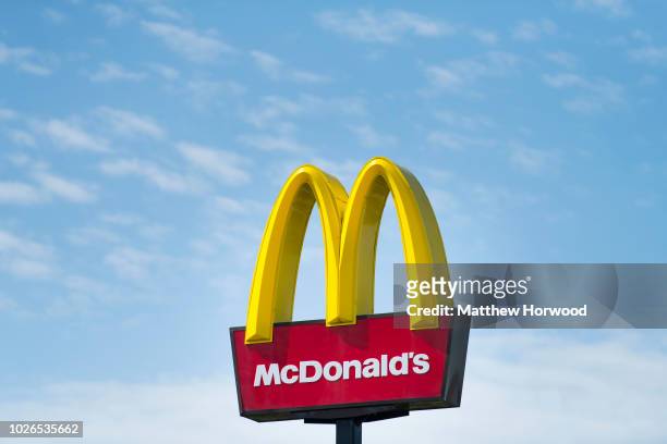 McDonald's Golden Arches sign seen on August 6, 2018 in Merthyr Tydfil, United Kingdom.