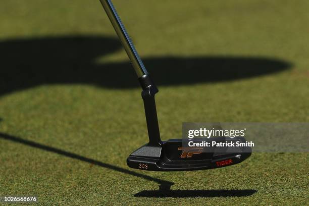 Detailed view of the putter of Tiger Woods of the United States as he putts on the third hole during the final round of the Dell Technologies...