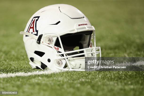 Detail of an Arizona Wildcats helmet on the field during the college football game against the Brigham Young Cougars at Arizona Stadium on September...