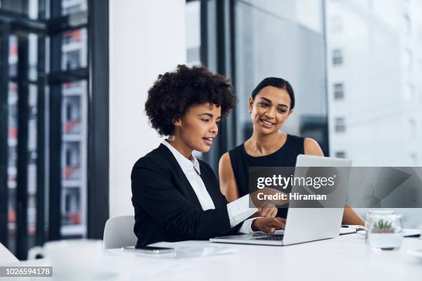 nothing gets results like a go getter team - black suit stock pictures, royalty-free photos & images