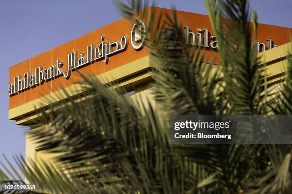 Pjsc Building Rooftop Logos sit on display around the rooftop of an Al-Hilal Bank PJSC bank ...