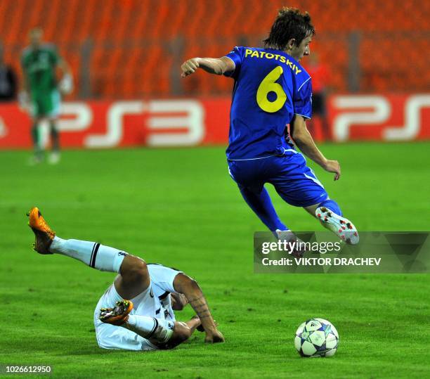 Sturm Graz's player Andreas Holzi fights for ball with Bate Borisov's player Oleg Patotski during their UEFA Champions League play off round football...