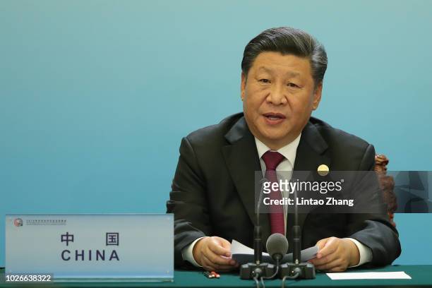 Chinese President Xi Jinping speaks during the during 2018 Beijing Summit Of The Forum On China-Africa Cooperation - Joint Press Conference at the...