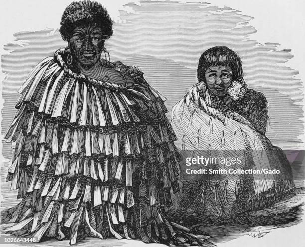 Black and white vintage print, depicting a seated Maori Chief, with facial ta moko wrapped in a flax mantle, with a serious expression on his face,...