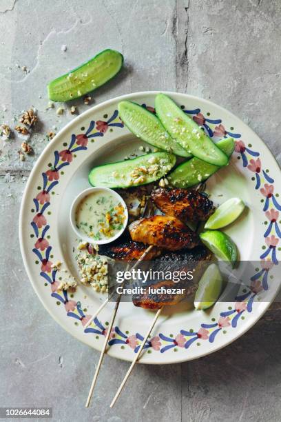 grilled satay chicken wings with peanut sauce - chicken tandoori stock pictures, royalty-free photos & images