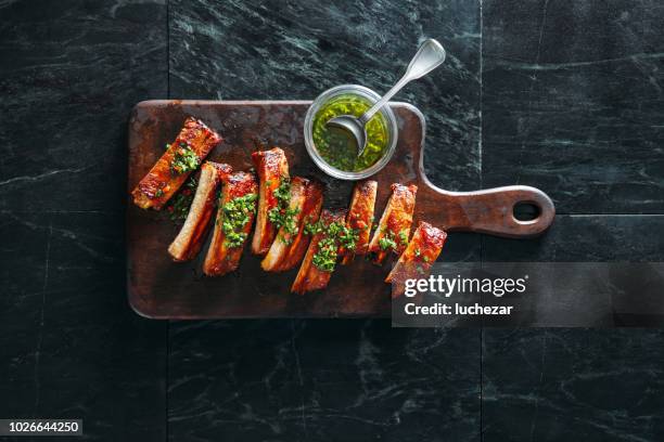 bbq pork ribs - chopping board from above stock pictures, royalty-free photos & images