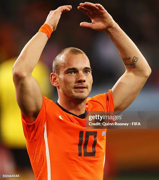Wesley Sneijder of the Netherlands celebrates after the 2010 FIFA World Cup South Africa Semi Final match between Uruguay and the Netherlands at...