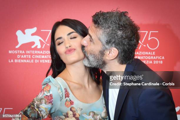 Actor Leonardo Sbaraglia kisses actress Lali Esposito during 'Acusada ' photocall during the 75th Venice Film Festival at Sala Casino on September 4,...