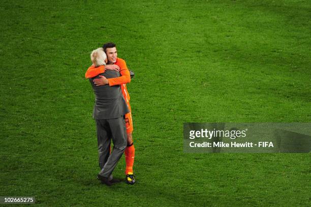 Bert van Marwijk head coach of the Netherlands embraces Robin Van Persie of the Netherlands after the 2010 FIFA World Cup South Africa Semi Final...