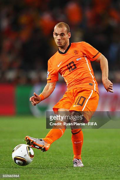 Wesley Sneijder of the Netherlands in action during the 2010 FIFA World Cup South Africa Semi Final match between Uruguay and the Netherlands at...