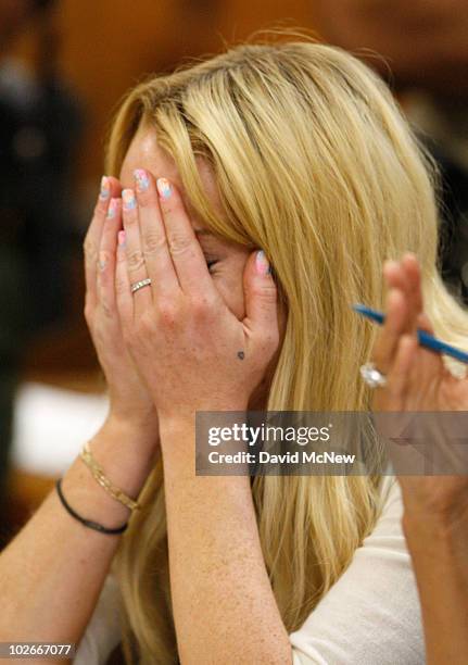 Actress Lindsay Lohan cries during her probation revocation hearing at the Beverly Hills Courthouse on July 6, 2010 in Los Angeles, California....