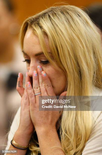 Actress Lindsay Lohan attends a probation revocation hearing at the Beverly Hills Courthouse on July 6, 2010 in Los Angeles, California. Lindsay...