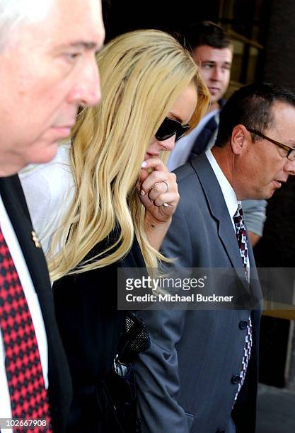 Actress Lindsay Lohan leaves Beverly Hills Courthouse after being found in violation of probation and will return to surrender July 20, 2010 at the...