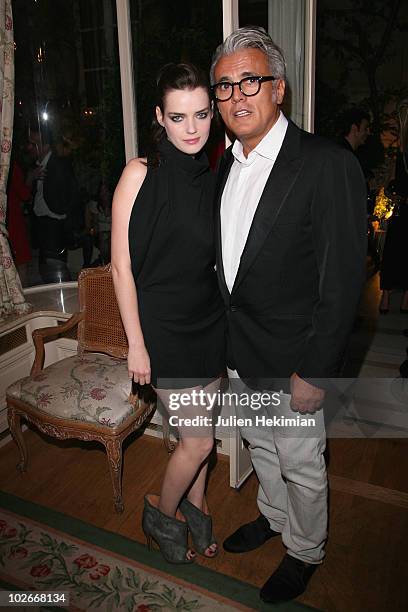 Roxane Mesquida and Giuseppe Zanotti attend the Giuseppe Zanotti cocktail party at Hotel Ritz on July 6, 2010 in Paris, France.