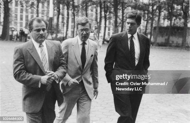 Gene Gotti and his lawyer Ronald Fischetti leave federal court in Brooklyn during a lunch break on July 21, 1988. Jeffrey C. Hoffman, attorney for...