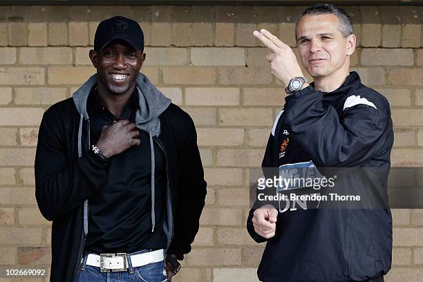 Footballer Dwight Yorke meets with Sydney FC head coach Vitezslav Lavicka during a meet and greet with his Sydney FC teammates ahead of the Sydney FC...