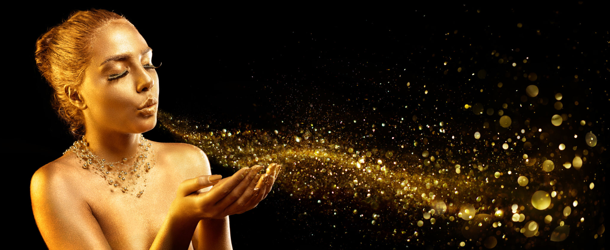 Gold Makeup - Fashion Model Blowing Golden Dust Gold Makeup - Fashion Model Blowing Golden Dust