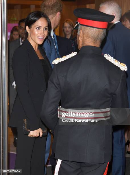 Meghan, Duchess of Sussex and Prince Harry, Duke of Sussex depart after attending the WellChild Awards at Royal Lancaster Hotel on September 4, 2018...