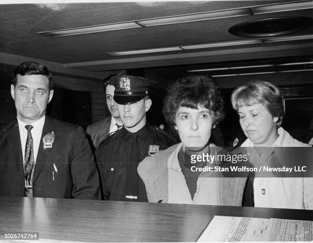 Valerie Solanas hears charges against her in the shooting of artist Andy Warhol on June 3, 1968 at the 13th Precinct in Manhattan.