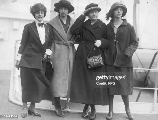 Physicist Marie Curie arrives in New York with her daughters Irene and Eve on the 'RMS OIympic', to raise funds for her research on radium, 1921....