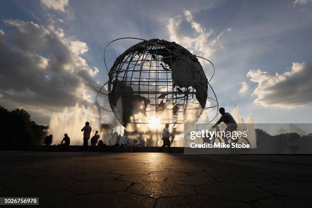 The sun sets behind the Unisphere on Day Nine of the 2018 US Open at the USTA Billie Jean King National Tennis Center on September 4, 2018 in the...