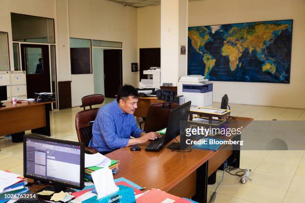 An employee works at the Insurance Corp. Of Afghanistan office in Kabul, Afghanistan, on Wednesday, July 11, 2018. ICA, a provider of life insurance...