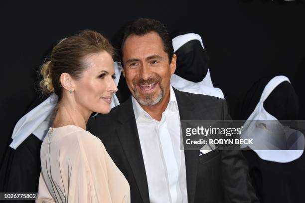 Mexican actor Demian Bichir and his wife singer Lisset Gutierrez attend the premiere of the film "The Nun", at the TCL Chinese Theatre in Hollywood,...