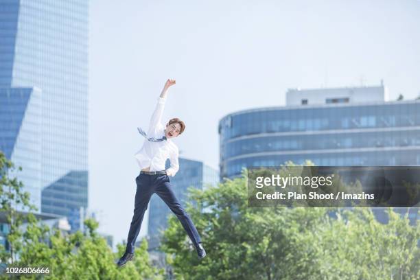 a cheering male office worker - yeouido stock pictures, royalty-free photos & images