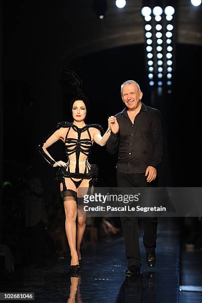 Dita Von Teese and designer Jean-Paul Gaultier walk the runway during the Jean-Paul Gaultier show as part of the Paris Haute Couture Fashion Week...