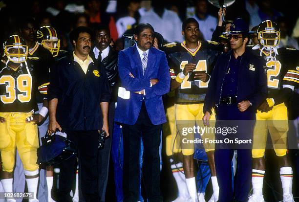 S: Head Coach Eddie Robinson of the Grambling State Tigers in the portrait with his arms folded watching the action from the sidelines circa early...