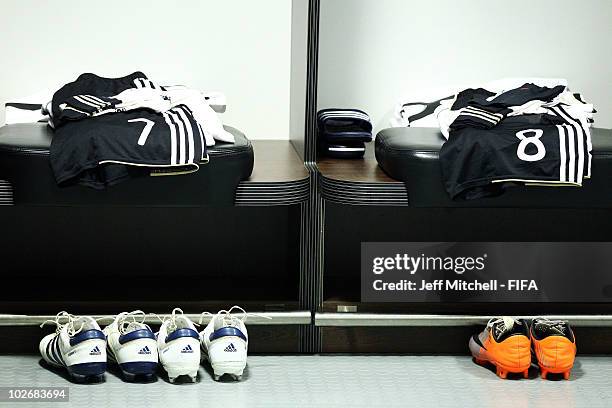 The kit of Bastian Schweinsteiger and Mesut Oezil of Germany are displayed in the dressing room ahead of the 2010 FIFA World Cup South Africa Semi...