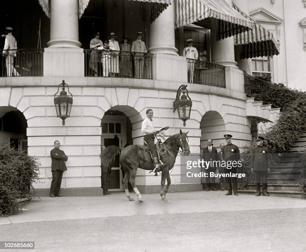 American film actor Tom Mix sits astride his horse, 'Wonder Horse Tony' , at the White House, Washington DC, May 21, 1926.