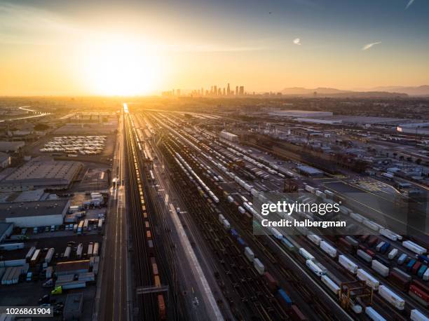 intermodal freight yard in vernon, ca at sunset - aerial view - rail transportation freight stock pictures, royalty-free photos & images