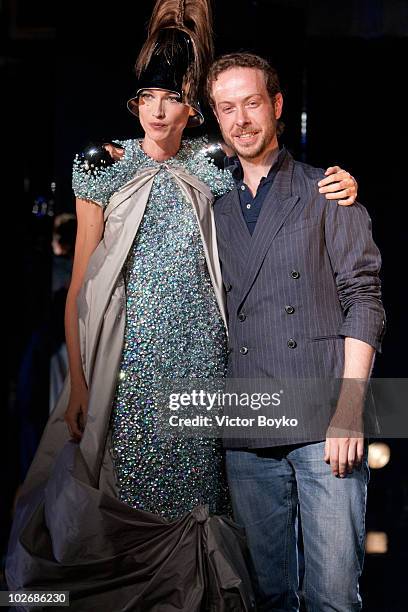 Jan Taminiau with model on the runway of the Jan Taminiau show as part of Paris Fashion Week Fall/Winter 2011 at BETC EURO RSCG on July 7, 2010 in...