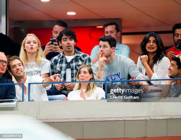 Sophie Turner, Joe Jonas, Nick Jonas, Priyanka Chopra at 2018 US Open each other at the 2018 US Open on September 4, 2018 in New York City.