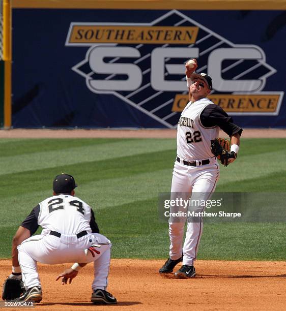 Vanderbilt shortstop Ryan Flaherty throws to first against Mississippi State in the SEC Baseball Tournament at Regions Park in Hoover, Alabama on...