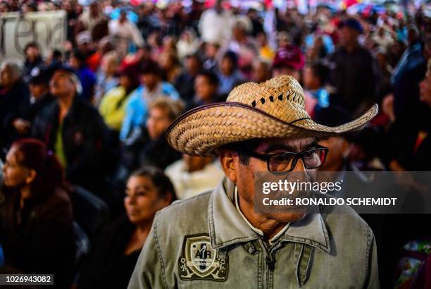 People take part in a rally of Mexican presidential candidate Andres Manuel Lopez Obrador, on June 14 in Chimalhuacan, Mexico State.