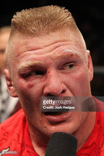 Brock Lesnar answers questions after defeating Shane Carwin during the UFC Heavyweight Championship Unification bout at the MGM Grand Garden Arena on...