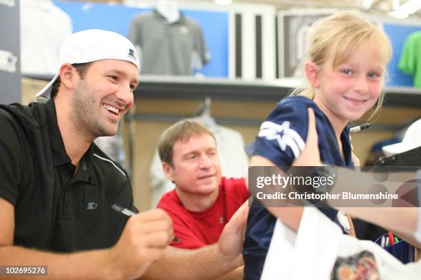 Dallas Cowboy quarterback and Starter spokesperson Tony Romo signs autographs at Walmart on July 7, 2010 in Arlington, Texas.