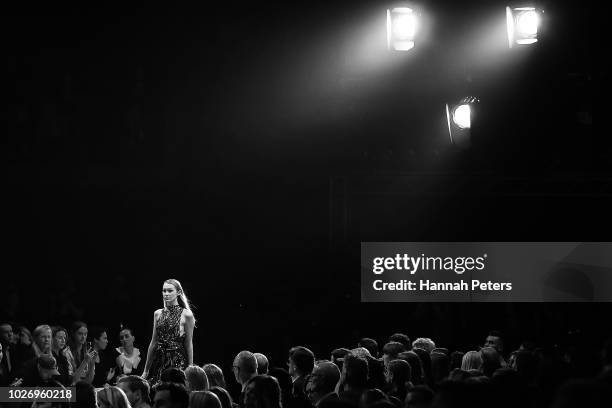 Model walks the runway during the Mercedes-Benz Presents Knuefermann show during New Zealand Fashion Week 2018 at Viaduct Events Centre on August 27,...