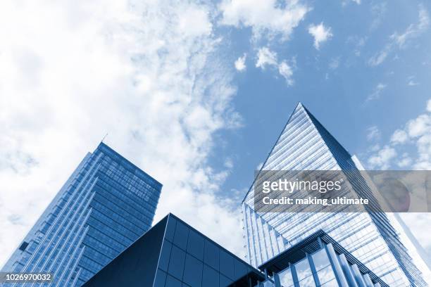 abstract view of a skyscraper - blue glass stock pictures, royalty-free photos & images